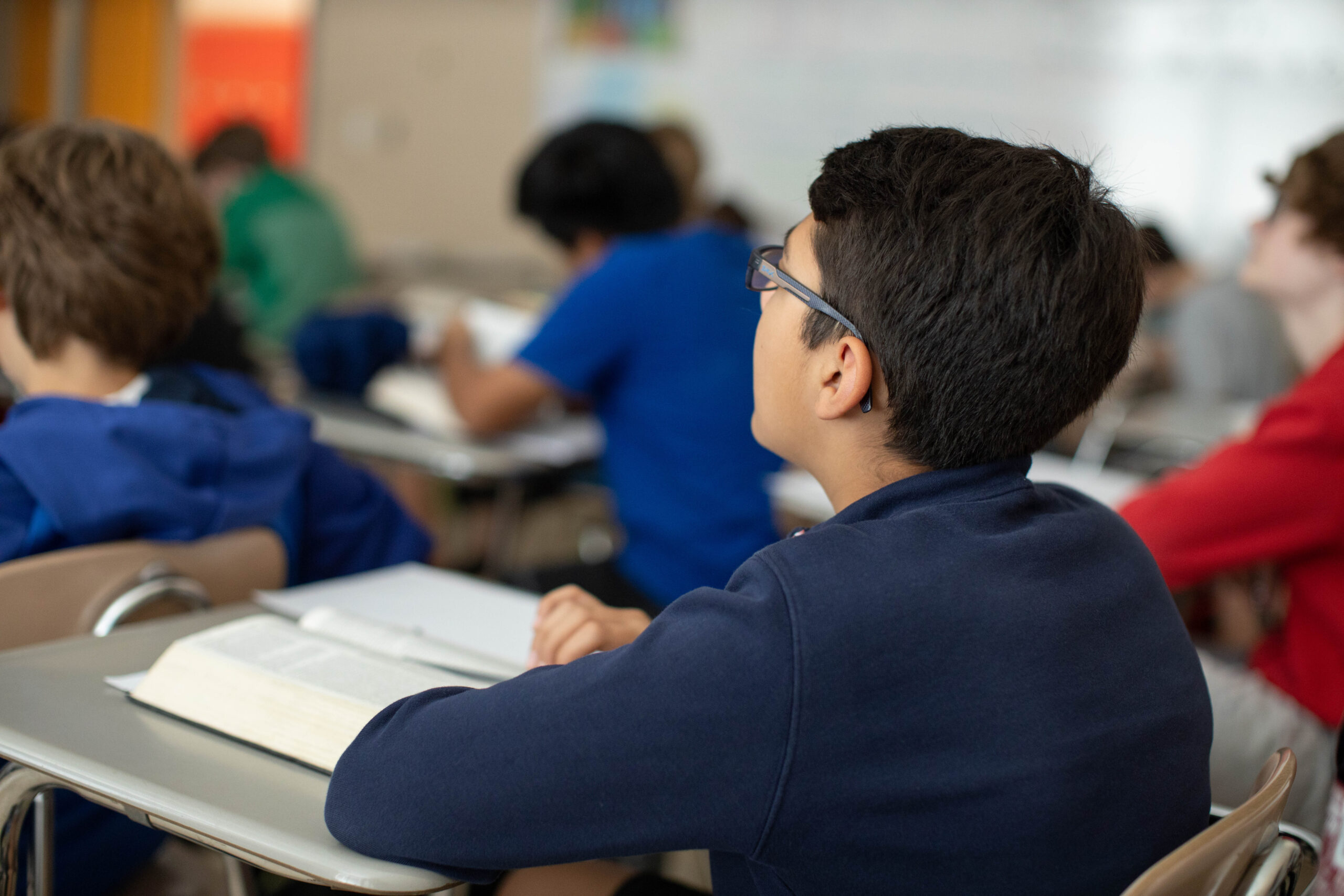 a student attentively listening to lessons