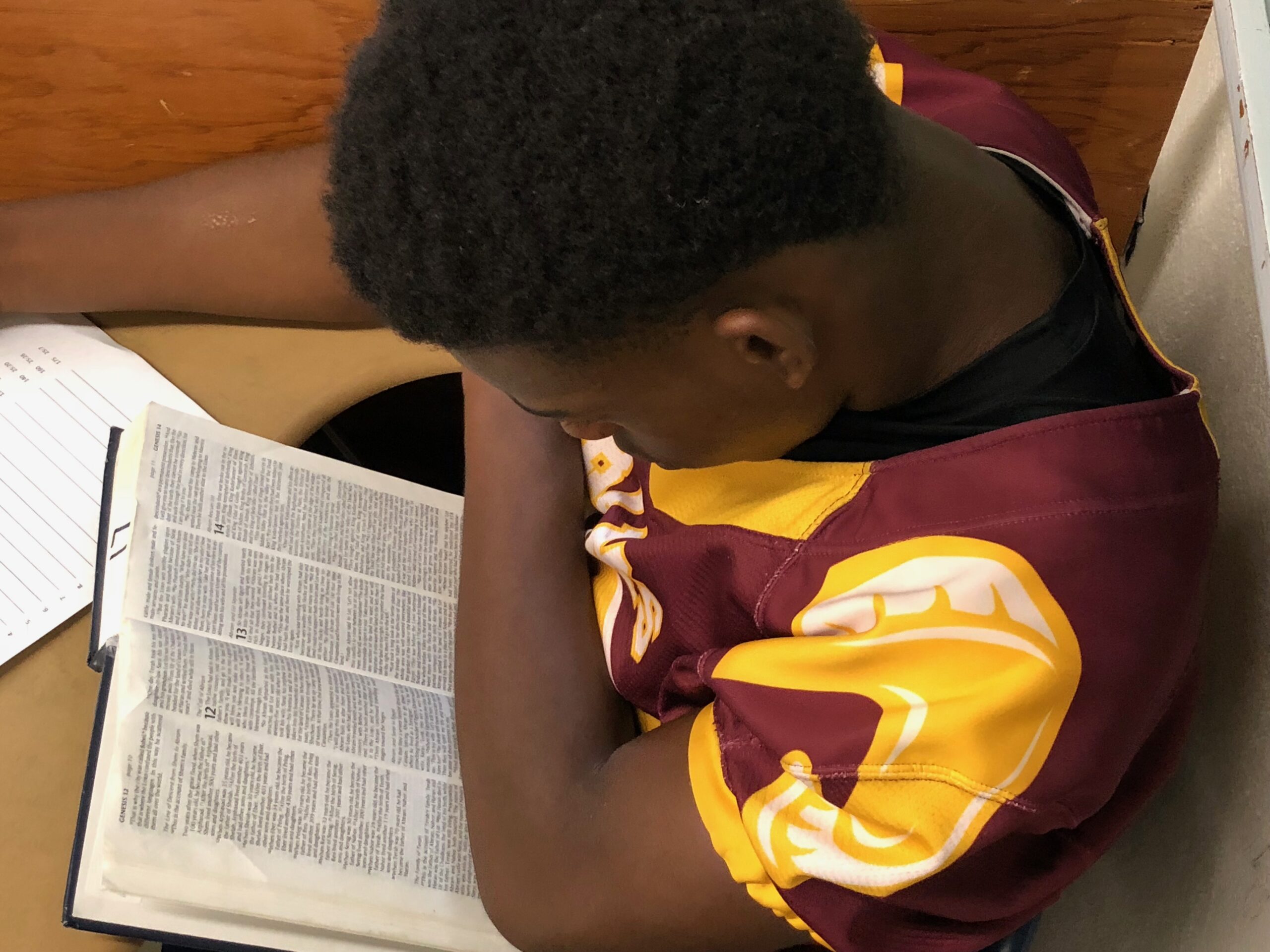 a student, reading his bible