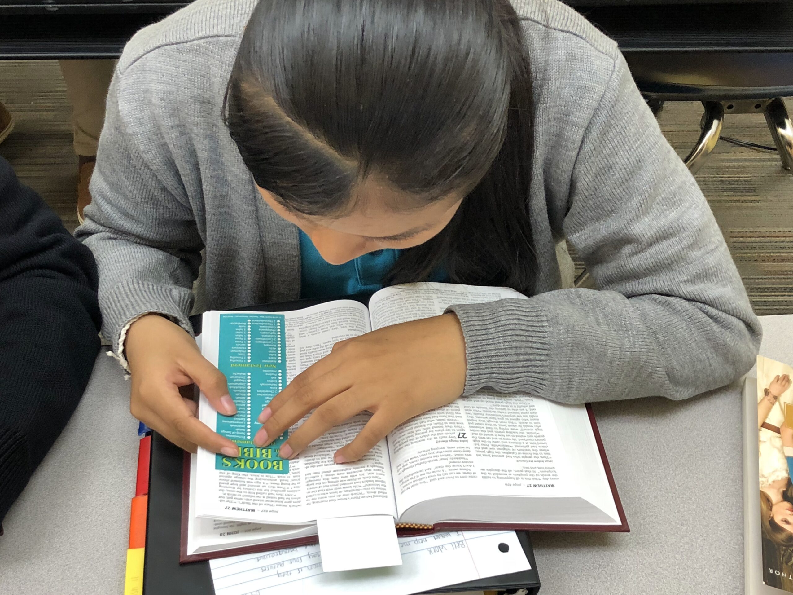 a student, reading his bible